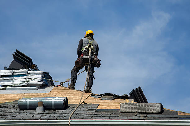 Professional Roof Replacement technician working in Seminole, OK